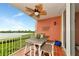 Peaceful balcony overlooking the water and lush greenery at 615 Riviera Dunes Way # 104, Palmetto, FL 34221