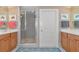 Large bathroom with double sinks and shower at 615 Riviera Dunes Way # 104, Palmetto, FL 34221