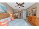 Spacious bedroom with king bed and two dressers at 615 Riviera Dunes Way # 104, Palmetto, FL 34221