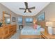 Main bedroom with king bed and water views at 615 Riviera Dunes Way # 104, Palmetto, FL 34221
