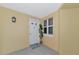 Bright condo entry with a beachy vibe at 615 Riviera Dunes Way # 104, Palmetto, FL 34221
