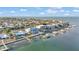 Bird's-eye view of waterfront homes and neighborhood at 635 Key Royale Dr, Holmes Beach, FL 34217