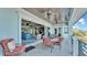 Balcony with sliding doors leading to living area and water views at 635 Key Royale Dr, Holmes Beach, FL 34217
