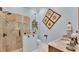 Elegant bathroom with walk-in shower, granite vanity, and decorative art at 635 Key Royale Dr, Holmes Beach, FL 34217