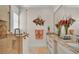 Spa-like bathroom with double vanity, granite counters, and a walk-in shower at 635 Key Royale Dr, Holmes Beach, FL 34217