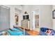 Light and airy bedroom with sliding barn door and en-suite bathroom at 635 Key Royale Dr, Holmes Beach, FL 34217