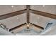High ceiling with exposed wooden beams and a ceiling fan at 635 Key Royale Dr, Holmes Beach, FL 34217