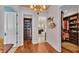 Spacious walk-in closet with custom built-ins and hardwood floors at 635 Key Royale Dr, Holmes Beach, FL 34217