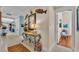 Bright entryway with decorative console table and view into adjacent rooms at 635 Key Royale Dr, Holmes Beach, FL 34217