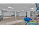Spacious garage with ample storage space for bikes and equipment at 635 Key Royale Dr, Holmes Beach, FL 34217