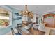 Open kitchen with breakfast nook, water views, and a large island at 635 Key Royale Dr, Holmes Beach, FL 34217