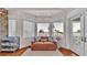 Sitting area with bay window, water views, and comfortable seating at 635 Key Royale Dr, Holmes Beach, FL 34217