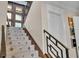 Modern staircase leading to upper level at 635 Key Royale Dr, Holmes Beach, FL 34217