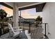 Relaxing balcony with white chairs and coastal views at 6605 Gulf Dr, Holmes Beach, FL 34217