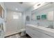 Modern bathroom with subway tile and walk-in shower at 6605 Gulf Dr, Holmes Beach, FL 34217