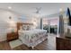 Main bedroom with king bed and ocean views at 6605 Gulf Dr, Holmes Beach, FL 34217