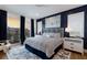 Second bedroom with a king-size bed and ocean view at 6605 Gulf Dr, Holmes Beach, FL 34217