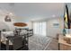 Guest bedroom with twin daybeds and access to patio at 6605 Gulf Dr, Holmes Beach, FL 34217