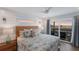 Main bedroom with king bed and ocean views at 6605 Gulf Dr, Holmes Beach, FL 34217
