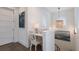 Small home office with built-in desk and chair at 6605 Gulf Dr, Holmes Beach, FL 34217