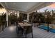 Outdoor dining area with pool and grill at 6605 Gulf Dr, Holmes Beach, FL 34217