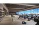 State-of-the-art gym with ocean views and modern equipment at 668 Quay Commons # 0705, Sarasota, FL 34236