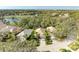 Aerial view of single Gathering home on a golf course community at 6710 Pebble Beach Way, Lakewood Ranch, FL 34202