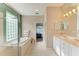 Large bathroom with a garden tub and separate shower at 6710 Pebble Beach Way, Lakewood Ranch, FL 34202