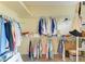 Walk-in closet with ample shelving and hanging space at 6710 Pebble Beach Way, Lakewood Ranch, FL 34202