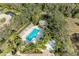 Arial view of community pool with surrounding tropical landscaping at 6710 Pebble Beach Way, Lakewood Ranch, FL 34202