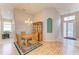 Dining room with hardwood floors and wooden table set at 6710 Pebble Beach Way, Lakewood Ranch, FL 34202