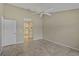 Spacious bedroom with tile flooring and access to bathroom at 7146 Lakeside Dr, Sarasota, FL 34243