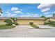 Houses with attached garages and neatly kept landscaping at 7146 Lakeside Dr, Sarasota, FL 34243