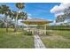 Community gazebo overlooking a peaceful lake at 7146 Lakeside Dr, Sarasota, FL 34243