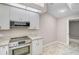Stainless steel appliances and granite countertops in this kitchen at 7146 Lakeside Dr, Sarasota, FL 34243