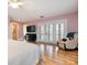 Spacious main bedroom with hardwood floors and access to balcony at 7147 Point Of Rocks Cir, Sarasota, FL 34242