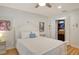 Bedroom with a queen-size bed and built-in closet at 7363 Silver Fern Blvd # 80, Sarasota, FL 34241