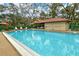 Inviting community pool with ample deck space at 7363 Silver Fern Blvd # 80, Sarasota, FL 34241