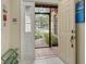 Bright entryway with tiled floors and access to a private courtyard at 7363 Silver Fern Blvd # 80, Sarasota, FL 34241