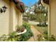 Landscaped walkway leading to the front entrance at 7363 Silver Fern Blvd # 80, Sarasota, FL 34241