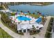 Community pool and clubhouse near lake at 7420 Newham Ln, Sarasota, FL 34240