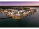 Aerial of waterfront community at sunset at 7420 Newham Ln, Sarasota, FL 34240