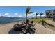 Waterfront fire pit with seating at 7420 Newham Ln, Sarasota, FL 34240