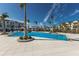 Large community pool with surrounding patio at 7420 Newham Ln, Sarasota, FL 34240