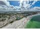 Aerial view of beach and coastline, showcasing beautiful turquoise water and white sand at 800 S Blvd Of Presidents # 12, Sarasota, FL 34236