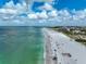 Aerial view of beach with turquoise water and white sand at 800 S Blvd Of Presidents # 12, Sarasota, FL 34236