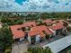 Complex overview showcasing landscaping and parking at 800 S Blvd Of Presidents # 12, Sarasota, FL 34236