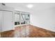 Spacious bedroom with tile floors and multiple windows at 800 S Blvd Of Presidents # 12, Sarasota, FL 34236