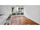 Open concept kitchen with breakfast bar and tiled floors at 800 S Blvd Of Presidents # 12, Sarasota, FL 34236
