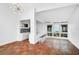 Modern kitchen with breakfast bar and terracotta tile floor at 800 S Blvd Of Presidents # 12, Sarasota, FL 34236